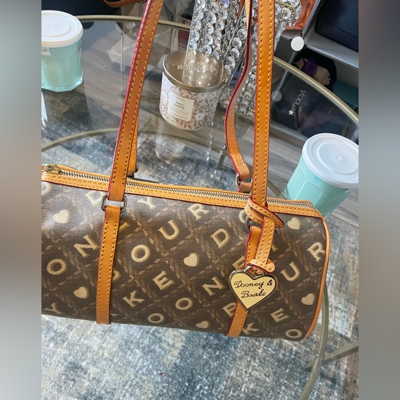 Dooney & Bourke (rare!!)
Barrel Brown/Tan/Cream Color Writing (Coffee) duffle - Picture 9 of 10
